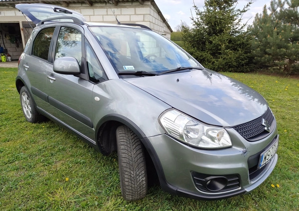 Suzuki SX4 cena 34500 przebieg: 135140, rok produkcji 2013 z Szczecinek małe 211
